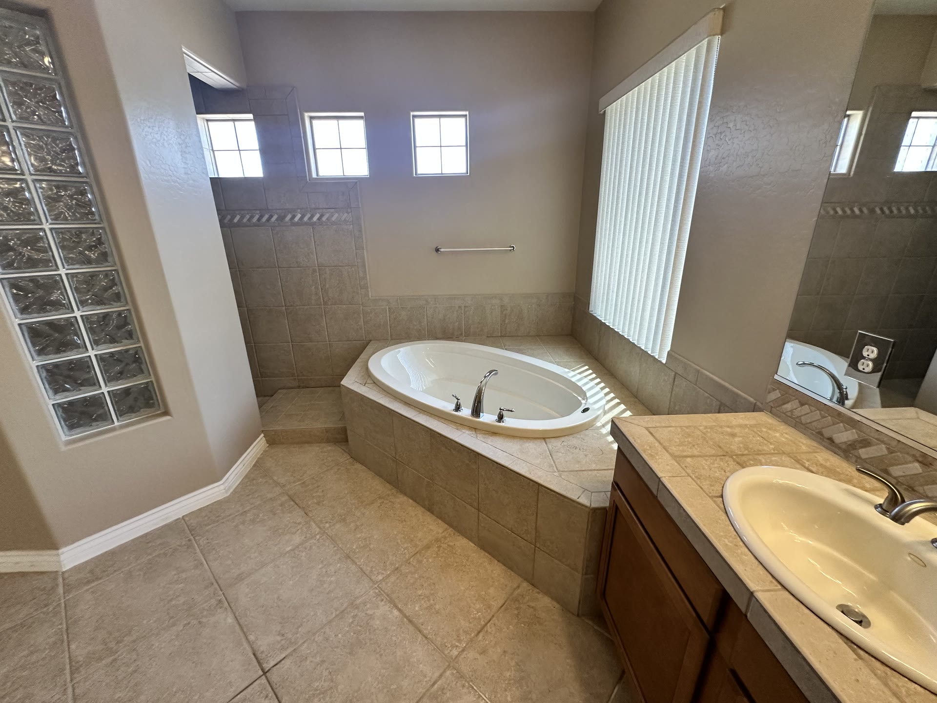 Dated primary bathroom before the Elevated Grind Properties transformation